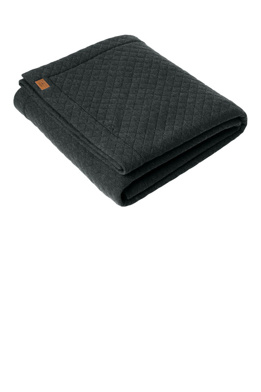 Manta con diseño de diamantes de TravisMathew TMA41481